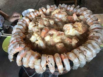 Close-up of hand holding roasted