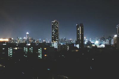 Illuminated cityscape at night