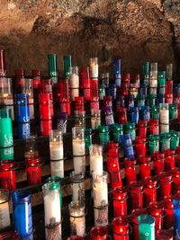 Close-up of multi colored bottles