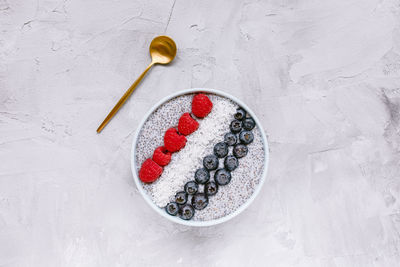 Overnight chia seed pudding with fresh berries in bowl, copy space