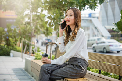 Young woman using mobile phone