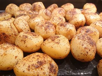 High angle view of fried potatoes in container