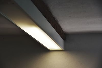 Low angle view of illuminated wall in building