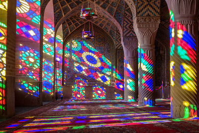 View of illuminated ceiling of building at night