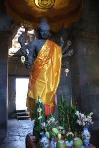 Statue of buddha outside building