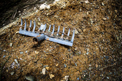 High angle view of old metal on field