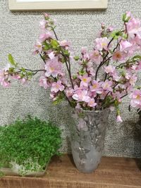 Close-up of pink flowers on table