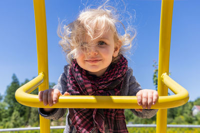 Portrait of boy playing in playground