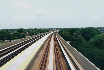 Railroad tracks against sky