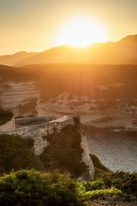 Scenic view of sea against sky during sunset