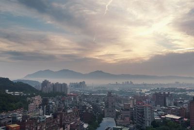 High angle view of city at dusk