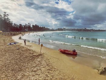 Scenic view of beach against sky