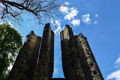 Low angle view of old building against sky