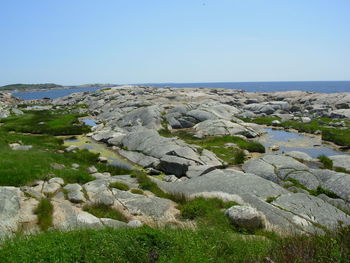 Scenic view of sea against clear blue sky