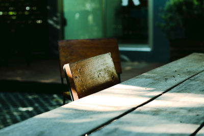 Close-up of old wooden table