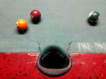 Close-up of red water on table