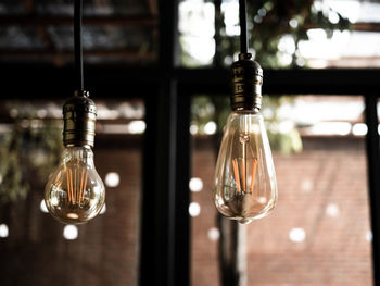 Close-up of illuminated light bulb