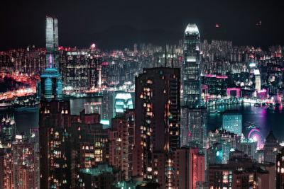 Aerial view of illuminated buildings in city at night