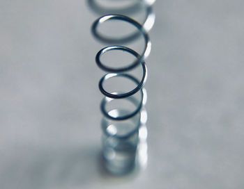 High angle view of spiral metal on table