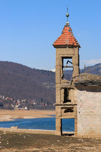 View of temple against clear blue sky