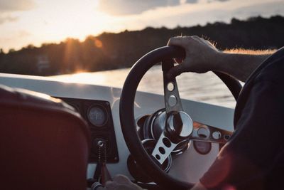 Close-up of hand holding car