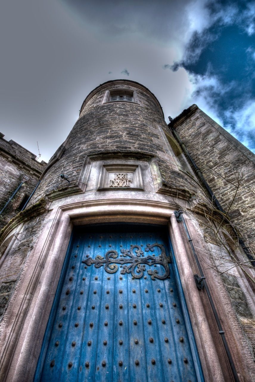 architecture, building exterior, built structure, low angle view, church, religion, place of worship, spirituality, sky, window, cathedral, history, facade, day, old, outdoors, blue, no people