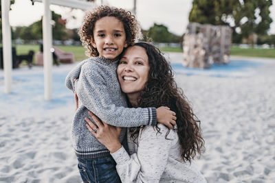 Portrait of happy mother and daughter