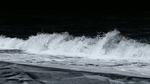 Waves splashing on rocks
