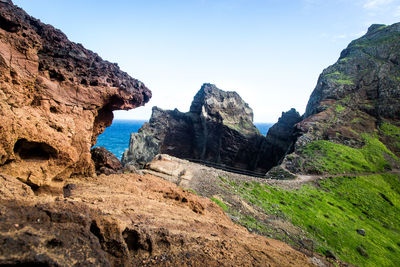 Scenic view of rocky mountains against clear sky