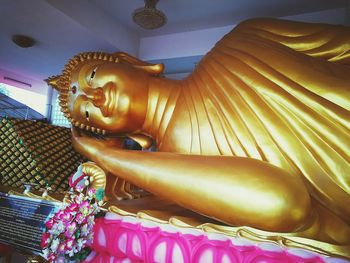 Gold buddha statue in temple