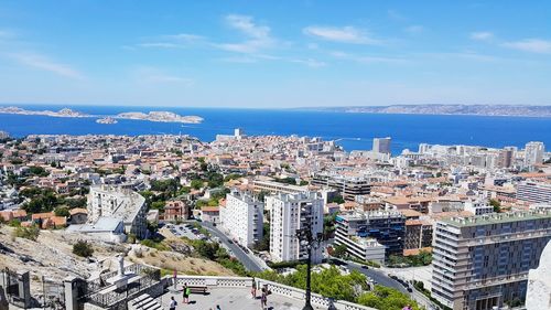 High angle view of cityscape at waterfront