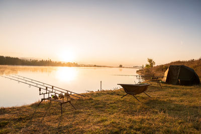 Fishing adventures, carp fishing in sunrise.