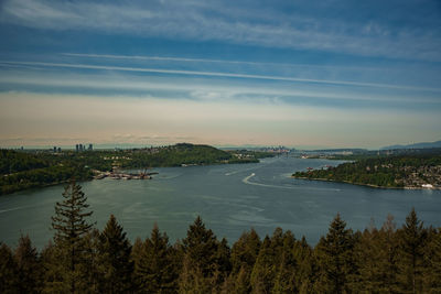 Scenic view of vancouver and burnaby with cargo ships and the iron workers memorial bridge