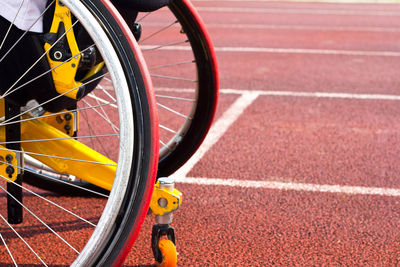 Cropped image of bicycles at sports track