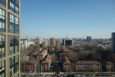 Buildings in city against sky