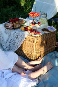 High angle view of woman sitting on table