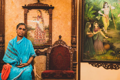 Portrait of a man sitting in temple