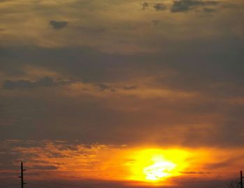 Scenic view of dramatic sky during sunset