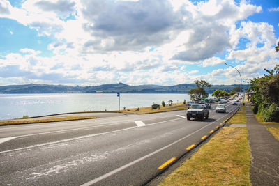 View of road against cloudy sky