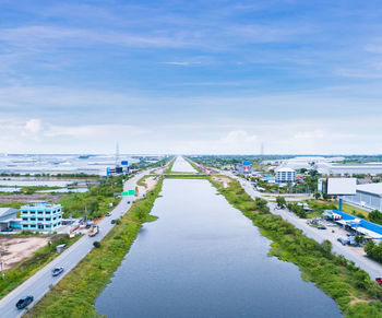 High angle view of river amidst buildings in city