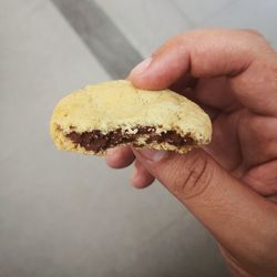 Close-up of hand holding bread