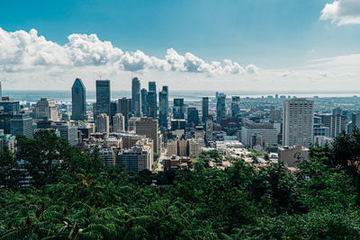 Modern buildings against sky in city