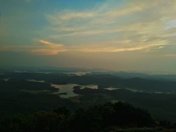 Scenic view of landscape against sky during sunset