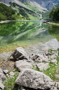 Scenic view of lake by mountain