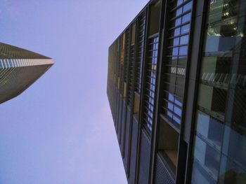 Low angle view of skyscraper against clear sky