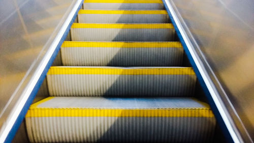 High angle view of yellow steps