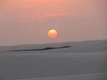 Scenic view of landscape against sky during sunset