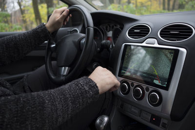 Close-up of man driving car