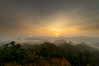 Scenic view of mountains against sky during sunset