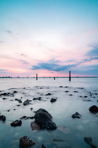 Scenic view of sea against sky during sunset